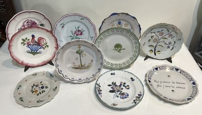 Set of ten earthenware plates, of various...