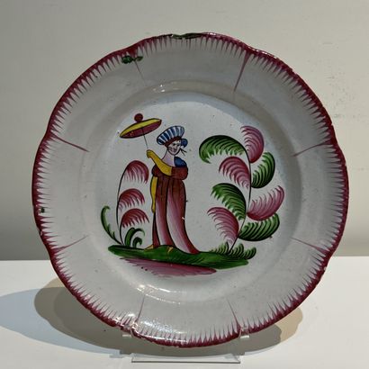 Two Eastern earthenware plates, one with...