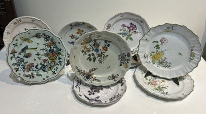 Set of nine regional earthenware plates of...