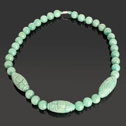Jade bead necklace, three larger oblong beads...