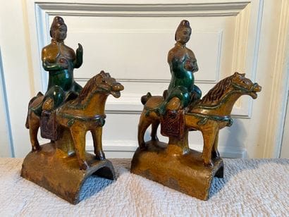 Pair of Chinese ceramic ridge tiles, featuring...