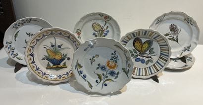 Set of eight regional earthenware plates,...