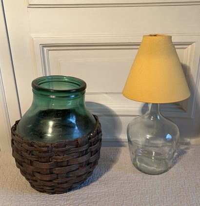 Basketry set including baskets. A green-tinted...