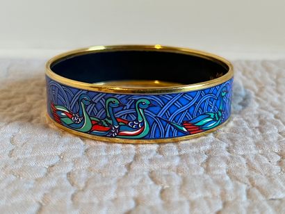 HERMES Paris. Gilt metal and enamel bangle...