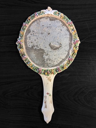 Porcelain hand mirror with polychrome floral...