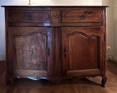 Rustic sideboard in molded fruitwood, the...