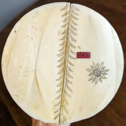 Large okimono representing a traveling fruit...