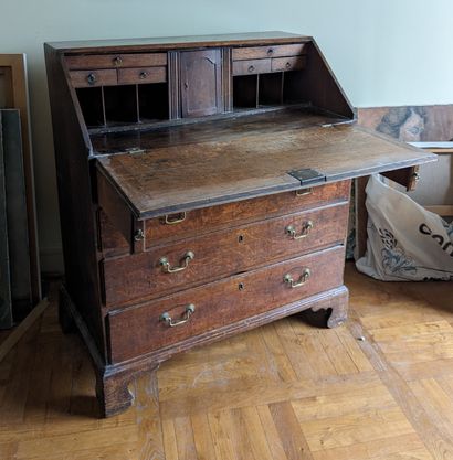 Oak scriban chest of drawers, opens with...