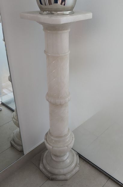 Two columns: one in alabaster, the shaft...