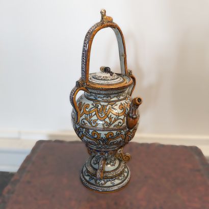 Earthenware peg with orange cameo decoration...