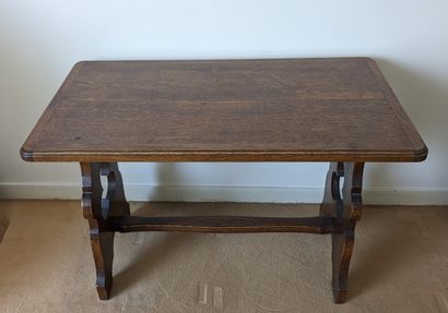 Oak book table with folding top. Moulded...