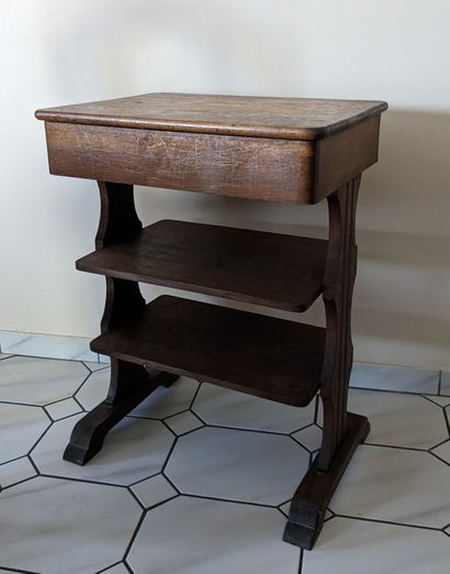 Oak book table with folding top. Moulded...