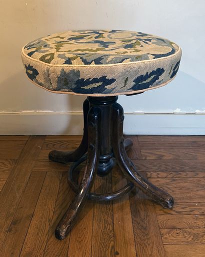 Piano stool in bentwood, seat upholstered...