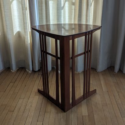 Suite of four corner nesting tables in varnished...