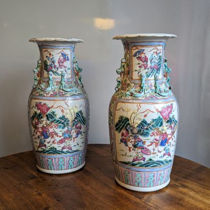 A pair of baluster-shaped porcelain vases...