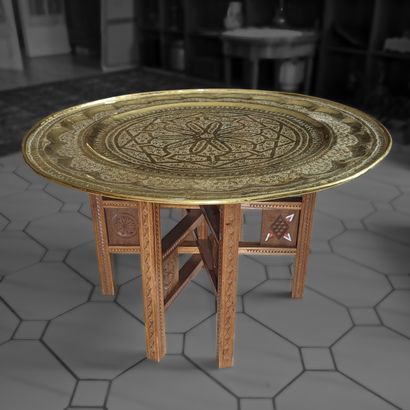 Large round brass tray with stylized chased...
