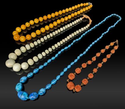 Two glass bead necklaces, one with blue olives,...