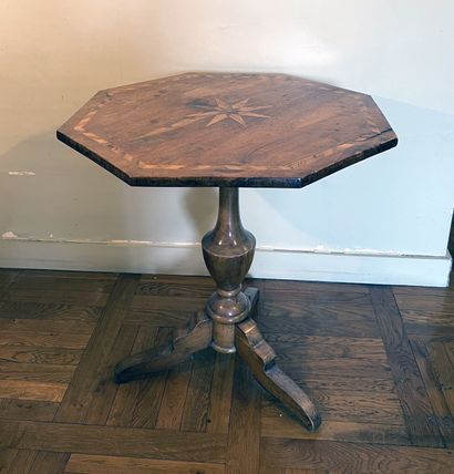 Pedestal table in fruitwood, the tilting...