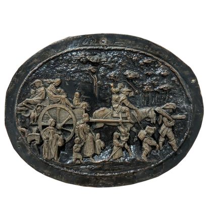 Oval medallion in partially black-lacquered...