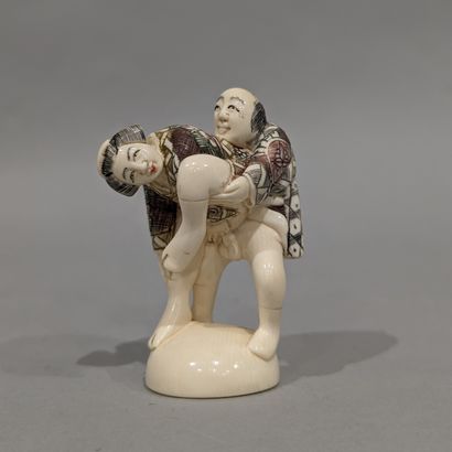 Japan, 20th century. Erotic Okimono with...