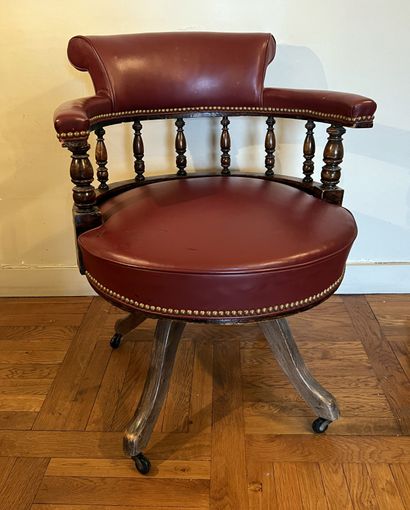 Office armchair in natural wood, the circular...