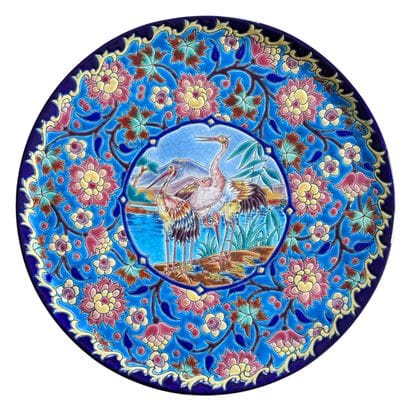 Grand plat à tarte en émaux de Longwy à décor...