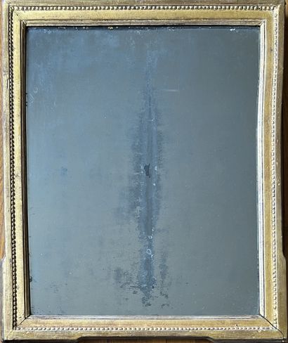 Gilded wood frame mirror with pearl frieze....