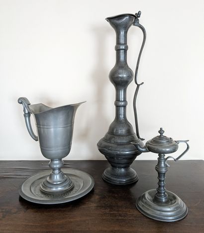 Set of pewter: helmet ewer, large ewer, oil...
