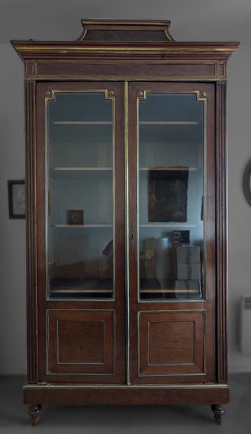 Mahogany and mahogany veneer bookcase with...