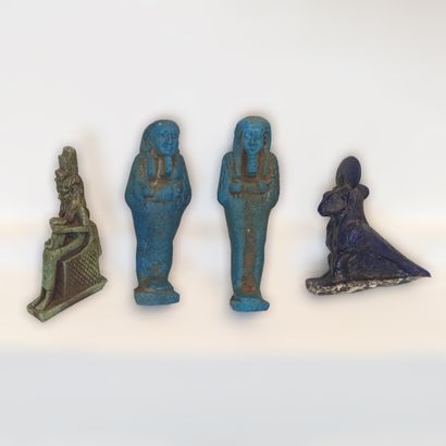 Four Egyptian amulets in glazed siliceous...