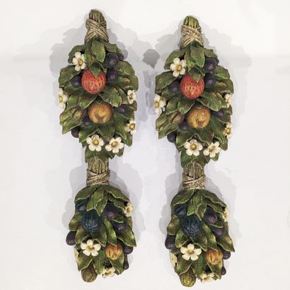 Two carved wood elements painted in polychrome...