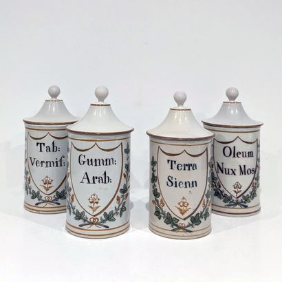 Suite of four earthenware medicine jars,...