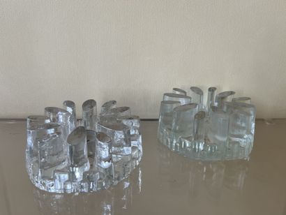 Pair of stoves in molded glass featuring...
