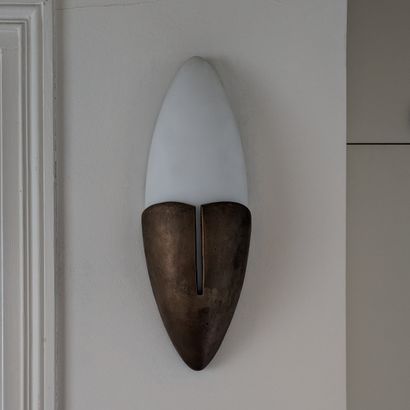 Egg-shaped wall lamp in patinated brass and...