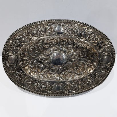 Silver plated oval dish with repoussé decoration...