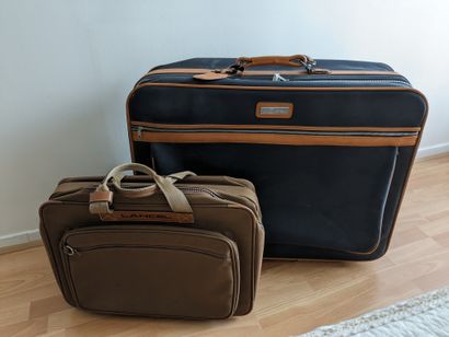 Two Lancel soft canvas suitcases. Large:...