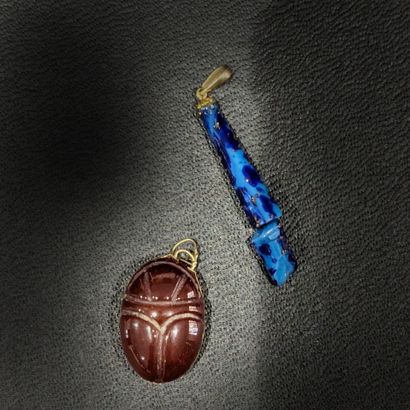 Carnelian scarab pendant in a yellow gold...