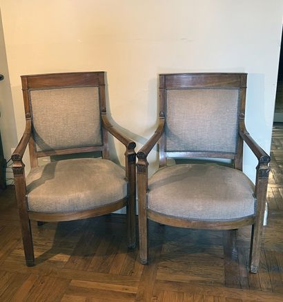 Pair of fruitwood armchairs, slightly arched...