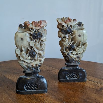 Pair of lardstone ornamental vases featuring...