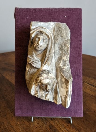 Carved stone element depicting the Virgin...