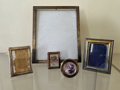 Five silver (800) photograph frames, on wooden...