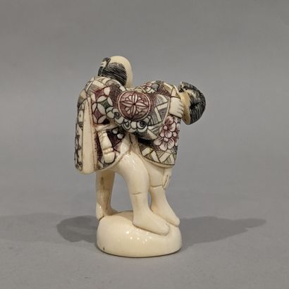 Japan, 20th century. Erotic Okimono with...