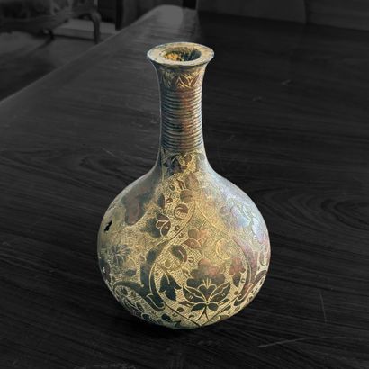 Small brass baluster vase, decorated with...