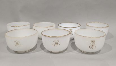 Set of seven white opaline glass finger-rinses,...