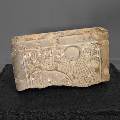 Fragment of a limestone stele with bas-relief...