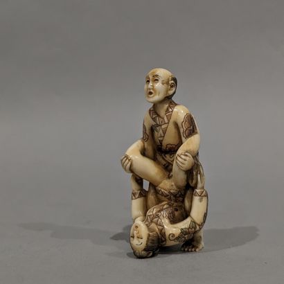 Japan, 20th century. Erotic netsuke with...