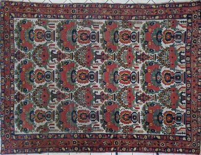Wool carpet decorated with flowering vases...