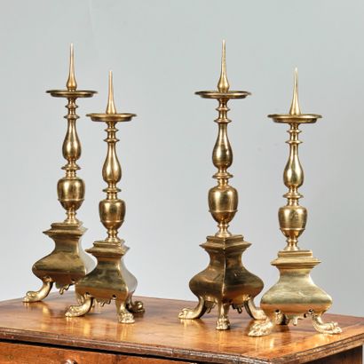 Deux paires de pique-cierges en bronze doré,...