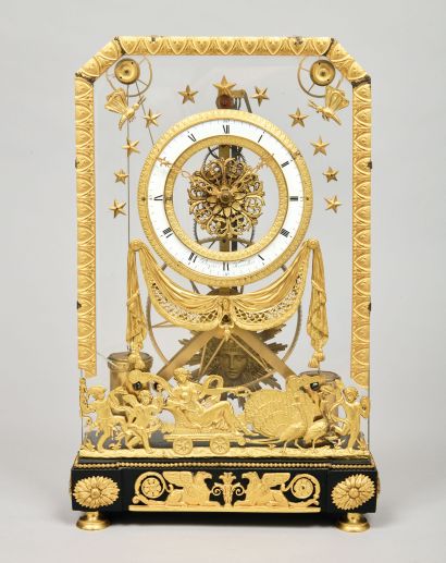 Pendule squelette en bronze doré au mat et...