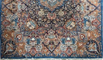 Grand tapis iranien en laine, à décor au...